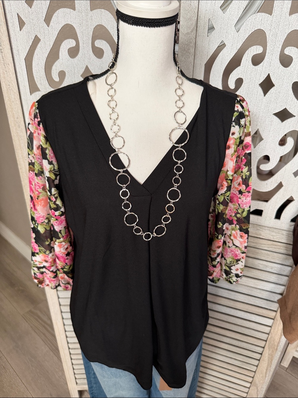 NAIF Black V-Neck Top with Pink Floral Sleeves